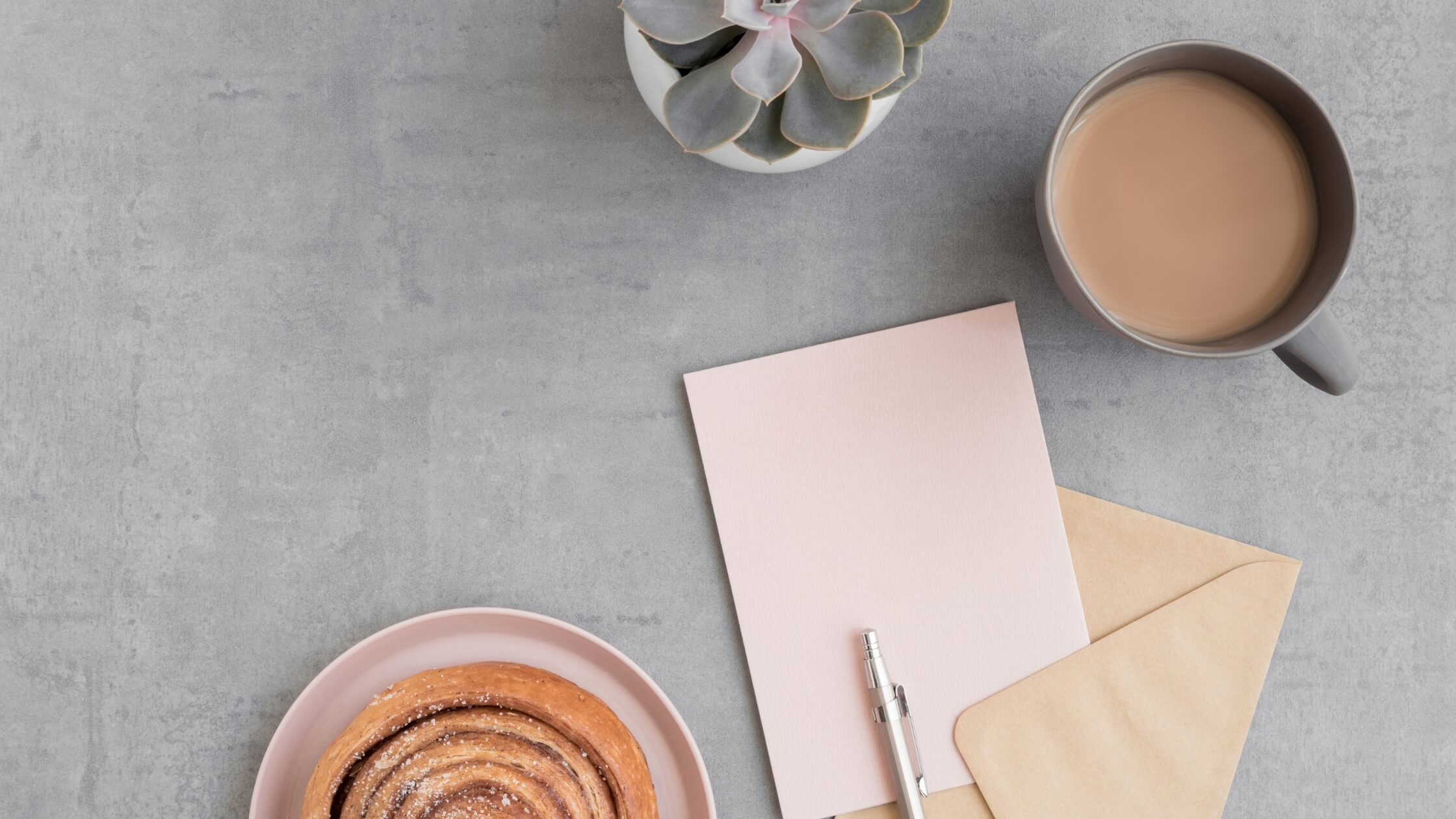 Pink envelope with coffee cup